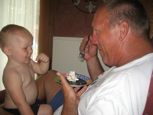 Malachi with Grandpa Jay sharing some Oreo ice cream cake!